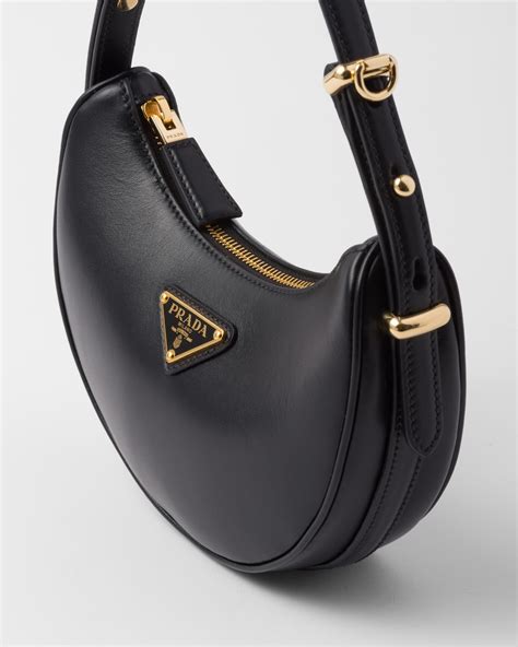 borsa prada arque|Arqué leather shoulder bag in black .